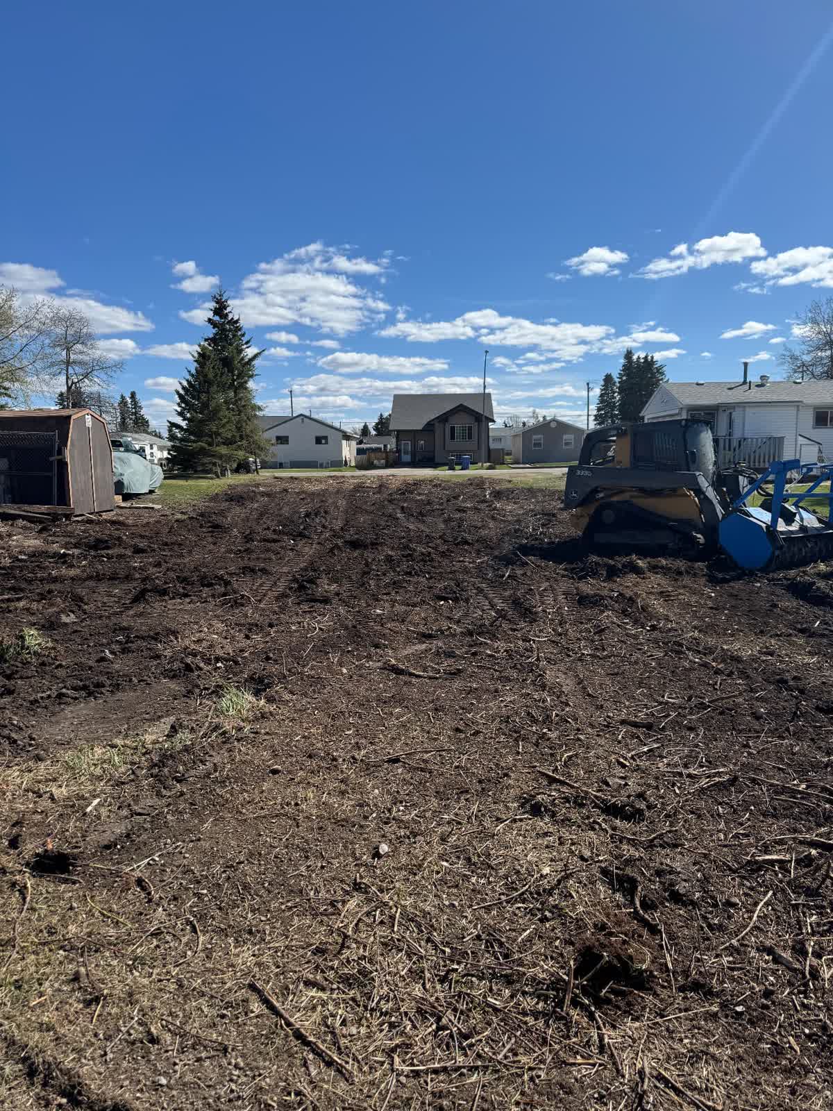 Same lot cleared and mulched flat after forestry mulching